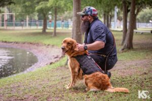 U.S. Veteran Nick and his Service Dog Timmy enjoy the lake in Florida. 